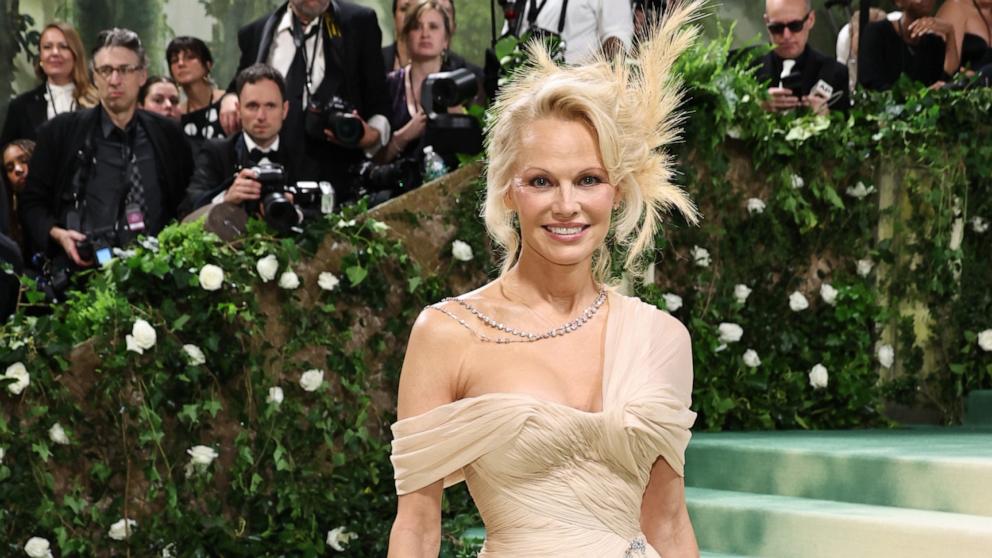 PHOTO: Pamela Anderson attends The 2024 Met Gala Celebrating "Sleeping Beauties: Reawakening Fashion" at The Metropolitan Museum of Art on May 6, 2024 in New York City.