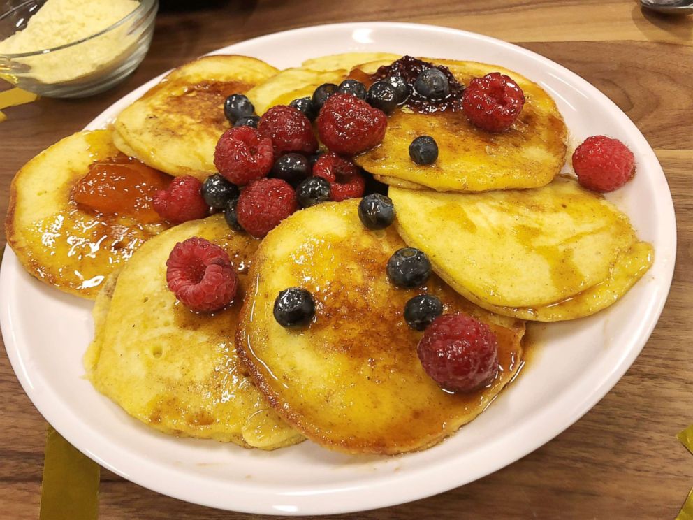 PHOTO: Alex Guarnaschelli's cornmeal buttermilk pancakes with spiced maple syrup and fresh berries.