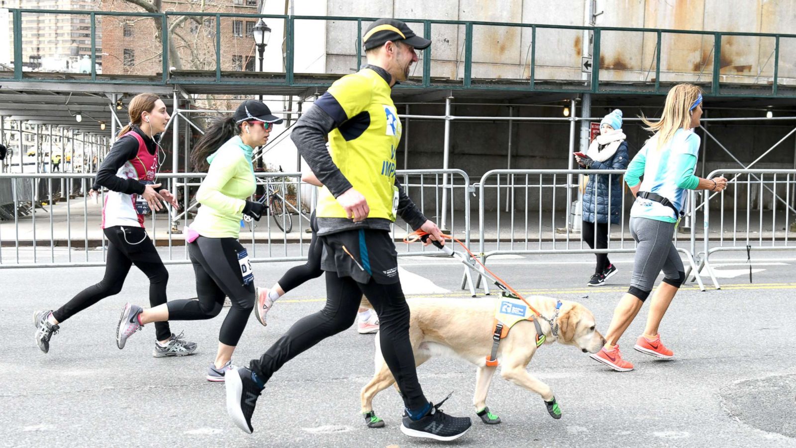 PHOTO: Guiding Eyes for the Blind President and CEO, Thomas Panek, runs the first ever 2019 United Airlines NYC Half Led Completely by Guide Dogs, with Gus, March 17, 2019, in New York.