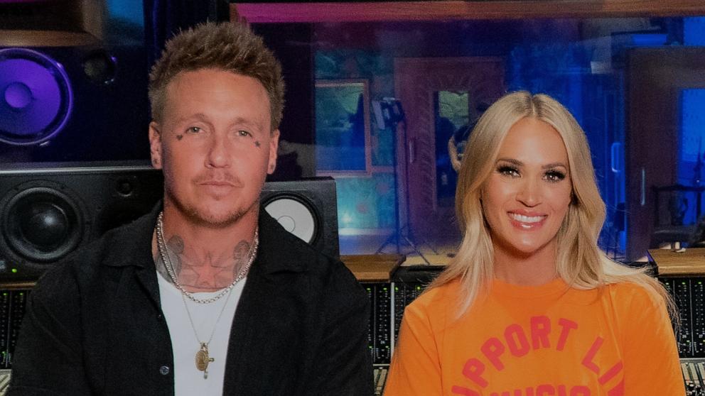 PHOTO: Carrie Underwood and Papa Roach forntman Jacoby Shaddix appear in this image for new recording of Papa Roach's hit song, "Leave a Light On (Talk Away The Dark)."