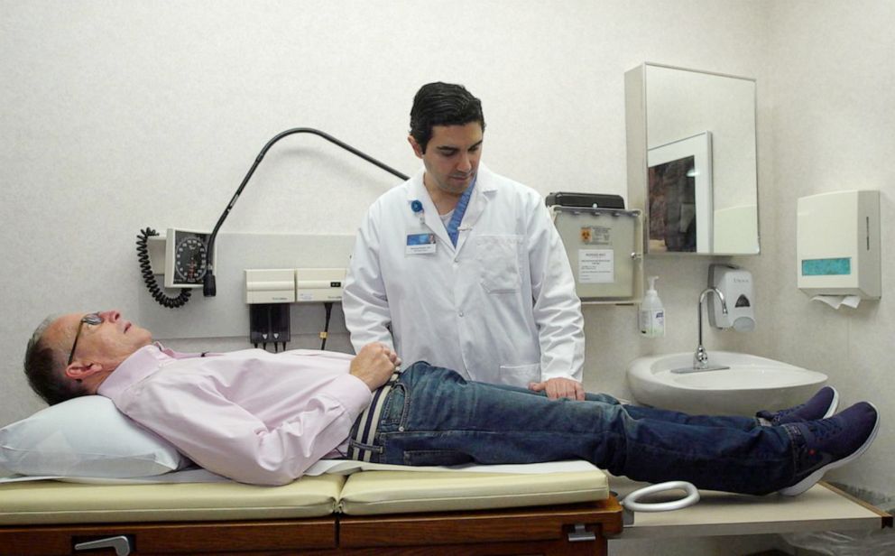 PHOTO: Chris Barr and his doctor, Dr. Mohamad Bydon. Bydon approached Barr about a potentially historic study that would repair his spinal cord injury.