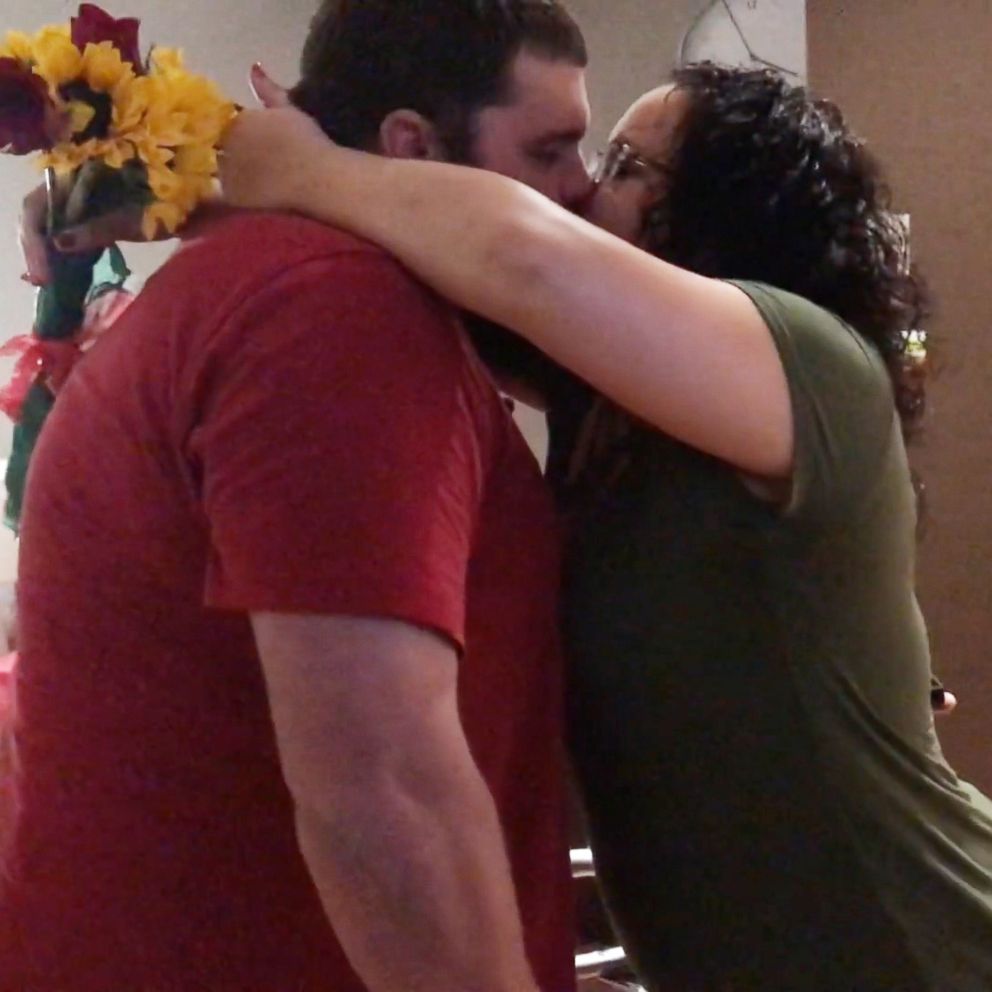 VIDEO: Man paralyzed by rare condition stands for first time to propose