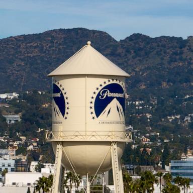 PHOTO: The Paramount Pictures water tower is seen in Los Angeles, Dec. 18, 2025, with the Hollywood sign in the distance.