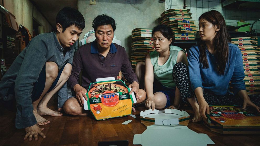 PHOTO: The Kim Family (Woo-sik Choi, Kang-ho Song, Hye-jin Jang, So-dam Park) in the film, "Parasite."