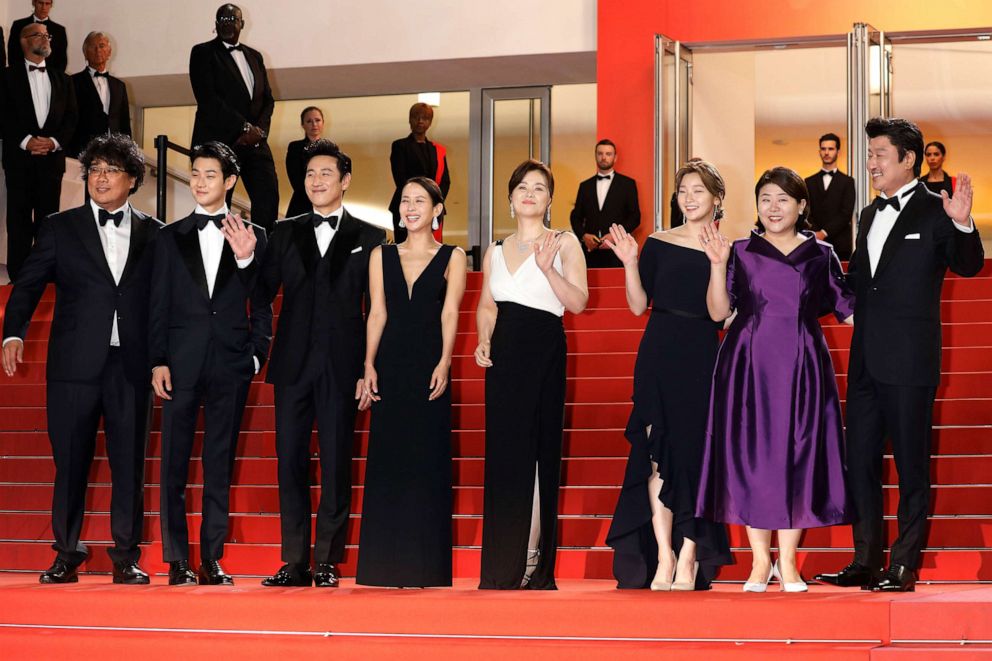 PHOTO: Bong Joon-Ho, Choi Woo-Shik, Lee Sun-Kyun, Cho Yeo-Jeong, Chang Hyae-Jin, Park So-Dam, Lee Jung-Eun and Kang-Ho Song at the premier red carpet for "Parasite" during the 72nd Cannes Film Festival at the Palais des Festivals, May 21, 2019, in Cannes.