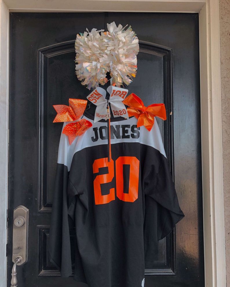 PHOTO: Central High School East senior Miranda Jones' cheerleading jersey hangs on her front door in Fresno, California.