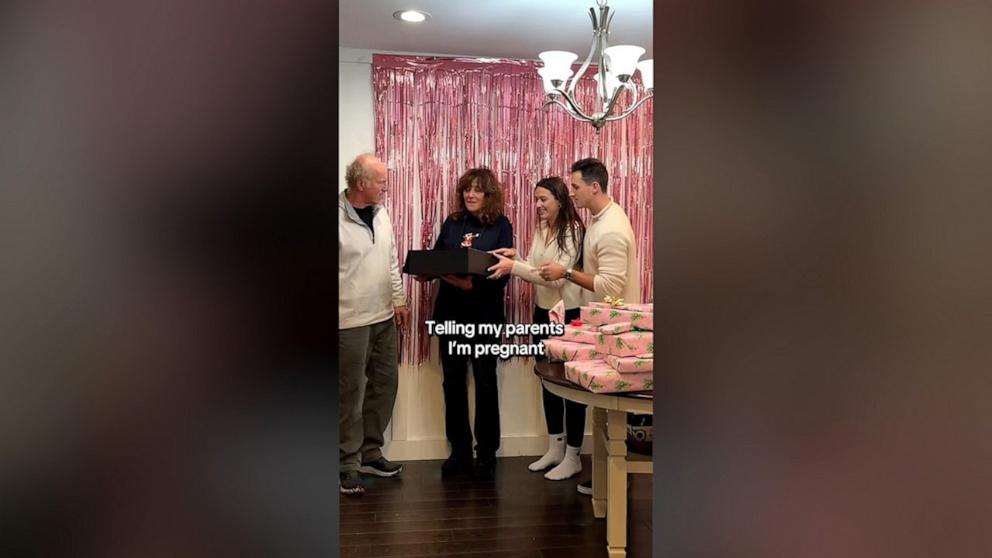 PHOTO: Sam Patterson and Monica Patterson surprised Monica’s parents Robert Gartner and Joni Gartner with the news that they were expecting a baby in December 2024. A TikTok video of the surprise has gone viral with over 1 million views.