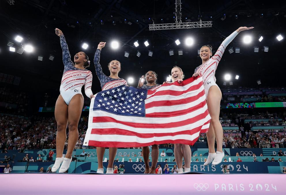 PHOTO: Jordan Chiles, Hezly Rivera, Simone Biles, Sunisa Lee and Jade Carey of the U.S. celebrate winning the gold medal after the artistic gymnastics women's team final at the 2024 Paris Olympics, July 30, 2024.