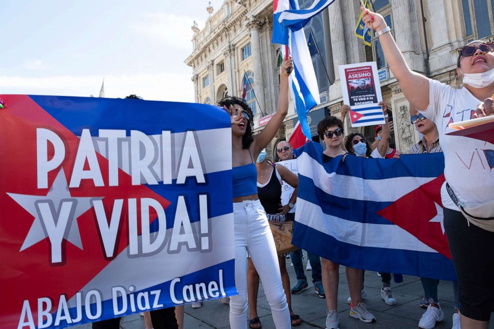 PHOTO: Cuban expatriates gather in Piazza Castello in Turin, Italy, to support the protests on the streets of Cuba against the Cuban government, July 17, 2021.