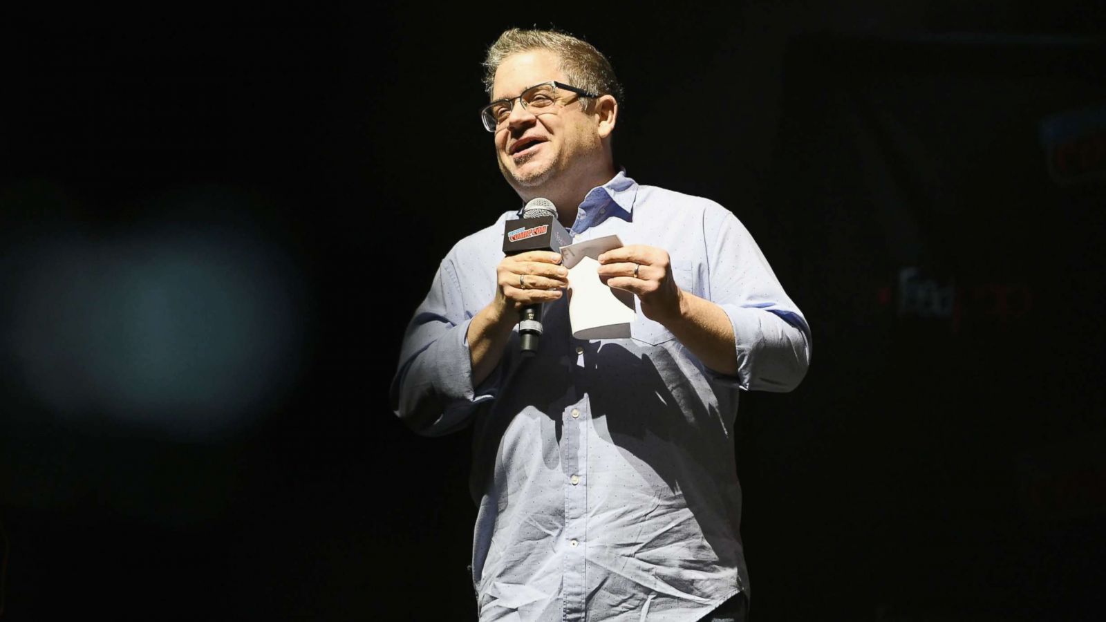 PHOTO: Host Patton Oswalt speaks onstage as Starz brings American Gods to NYCC 2018 at Hammerstein Ballroom, Oct. 5, 2018 in N.Y.