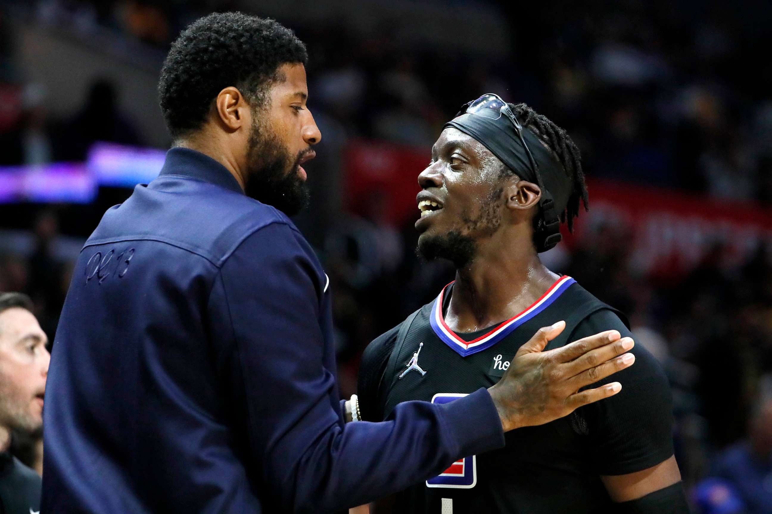 PHOTO: FILE - Paul George congratulates Clippers teammate Reggie Jackson for scoring 36 points leading the way to a 132-111 win over the Lakers at Crypto.Com Arena.
