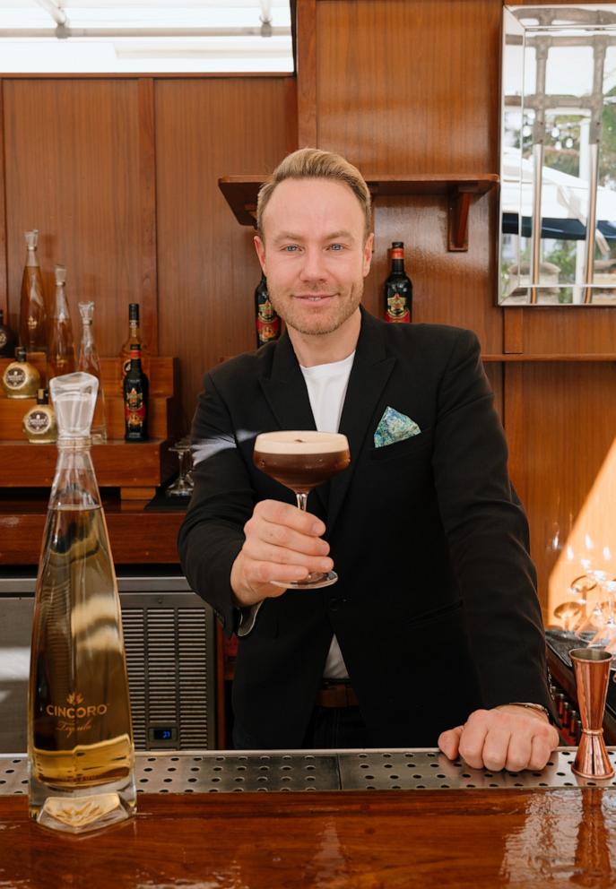 PHOTO: Paul Zahn holds up an espresso martini.