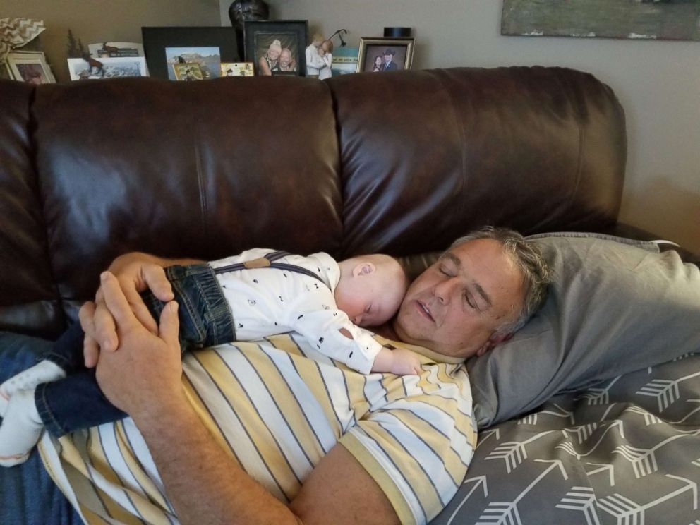 PHOTO: Ty Waterhouse naps with his grandfather.