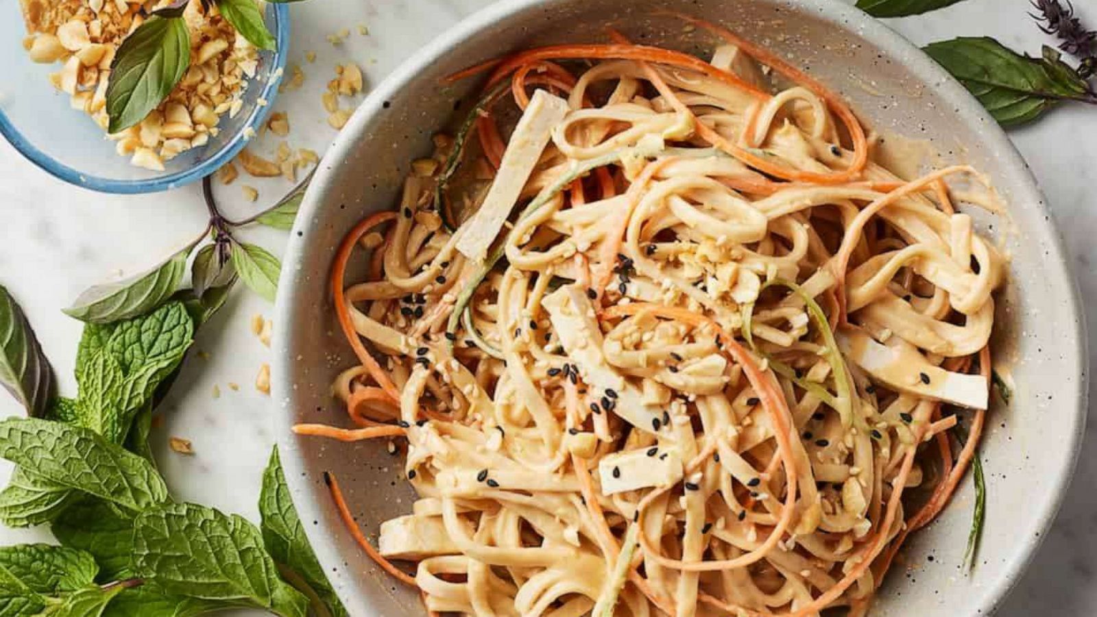 PHOTO: Creamy peanut noodles with tofu and fresh veggies.