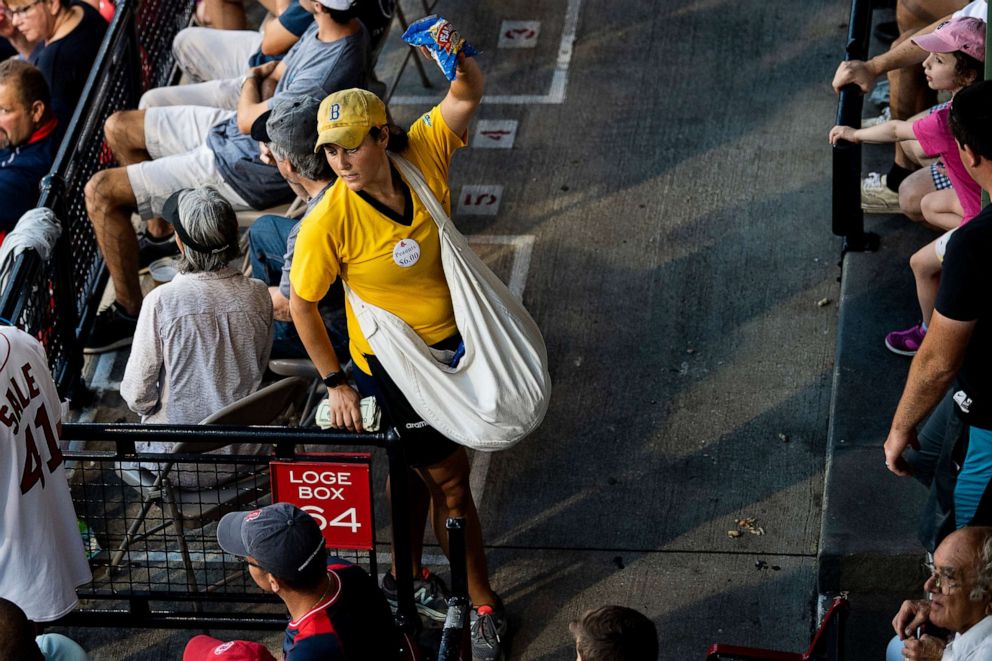 PHOTO: A vendor sells peanuts during a game between the Boston Red Sox and the New York Yankees on July 26, 2019 at Fenway Park in Boston, Massachusetts.