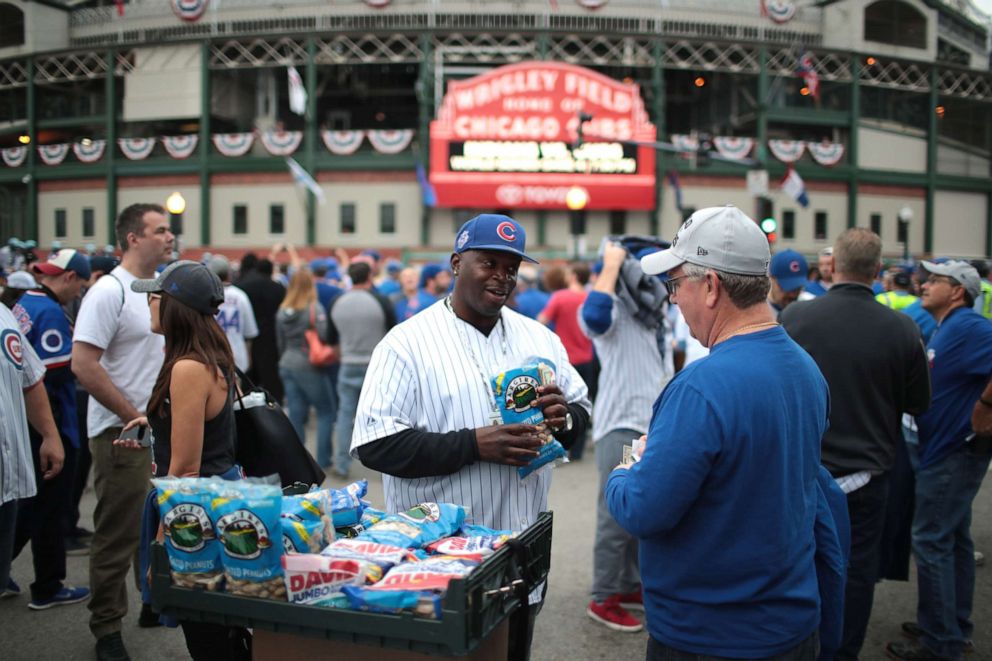 PHOTO: A vendor sells peanuts outside Wrigley Field before Game Four of the 2016 World Series between the Chicago Cubs and the Cleveland Indians at Wrigley Field on October 29, 2016 in Chicago, Illinois.