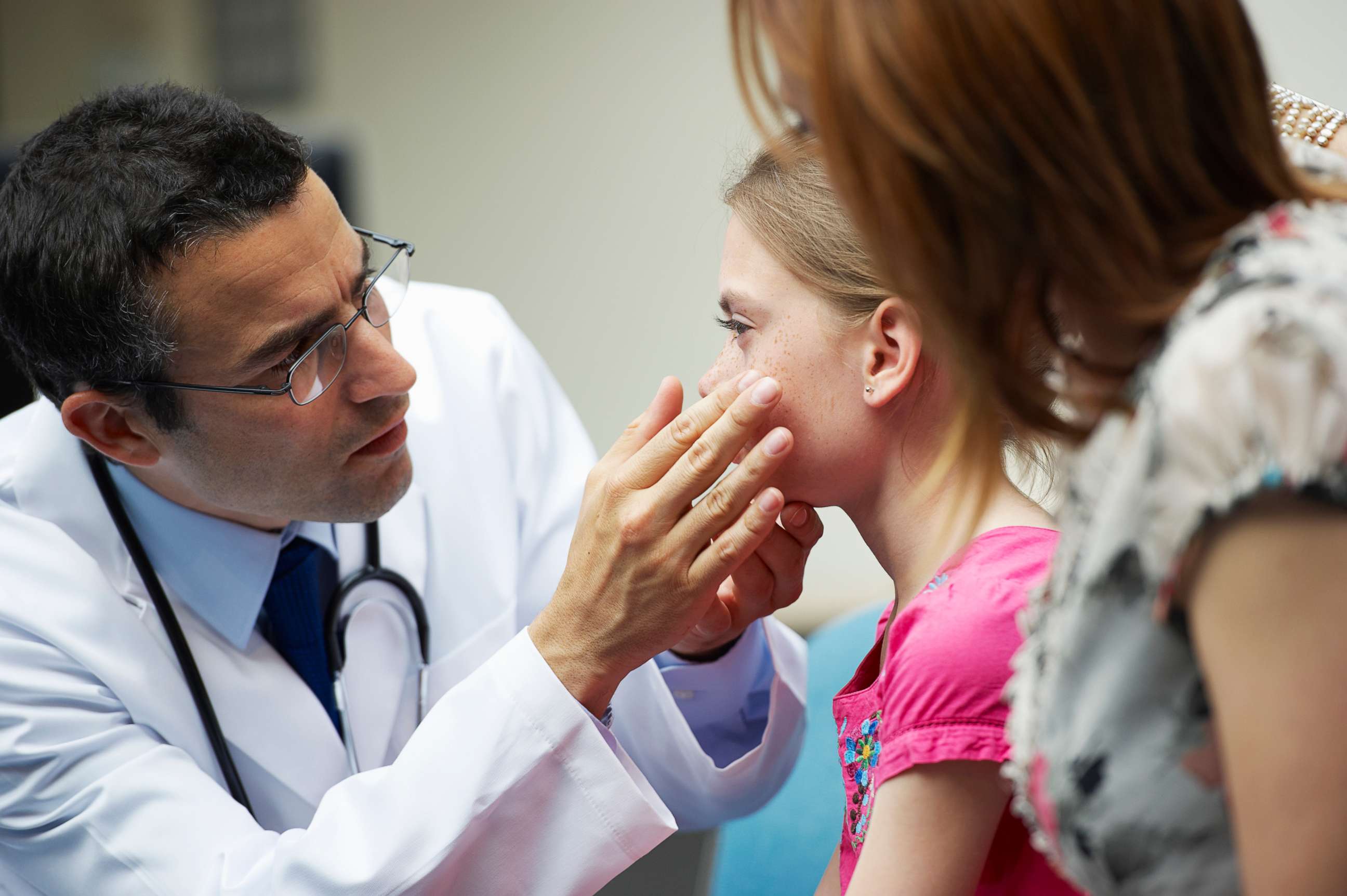PHOTO: A pediatrician check a child in this stock photo.