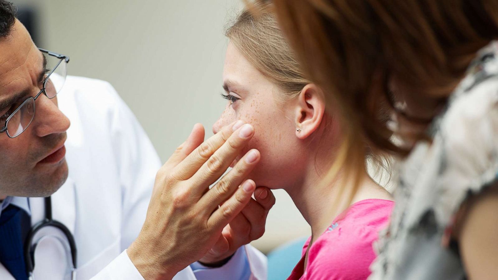 PHOTO: A pediatrician check a child in this stock photo.