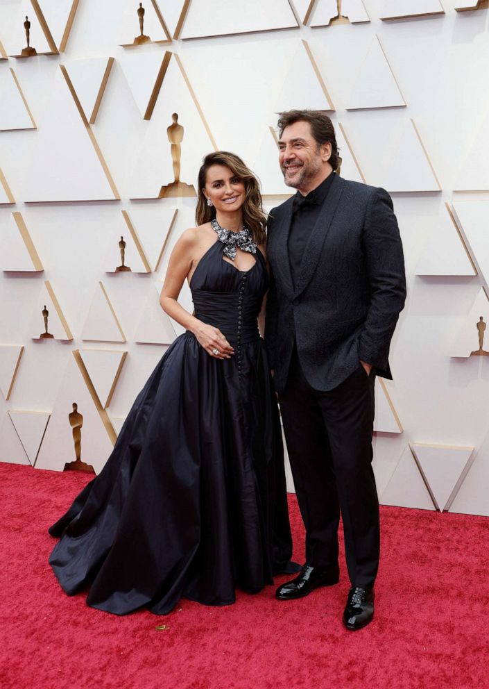 PHOTO: Penelope Cruz and husband Javier Bardem pose on the red carpet during the Oscars arrivals at the 94th Academy Awards in Hollywood, Calif., March 27, 2022. 