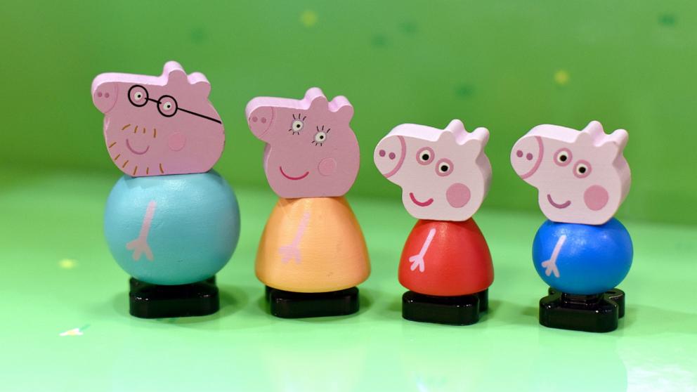 PHOTO: In this Jan. 21, 2020, file photo, Peppa Pig and friends wooden figures are on display during a toy fair in London.`