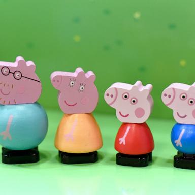 PHOTO: In this Jan. 21, 2020, file photo, Peppa Pig and friends wooden figures are on display during a toy fair in London.`