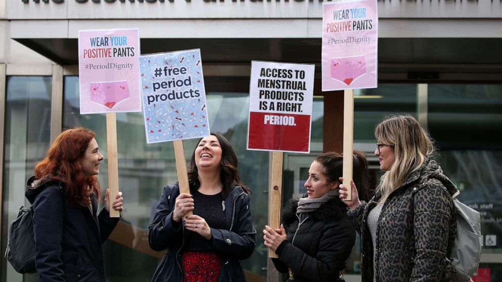 PHOTO: In this Feb. 25, 2020, file photo, Monica Lennon MSP (second left) joins supporters of the Period Products bill at a rally outside Parliament in Edinburgh, Scotland.