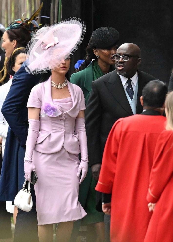 PHOTO: Katy Perry and Edward Enninful arrive at Westminster Abbey ahead of the Coronation of King Charles III and Queen Camilla on May 6, 2023 in London.