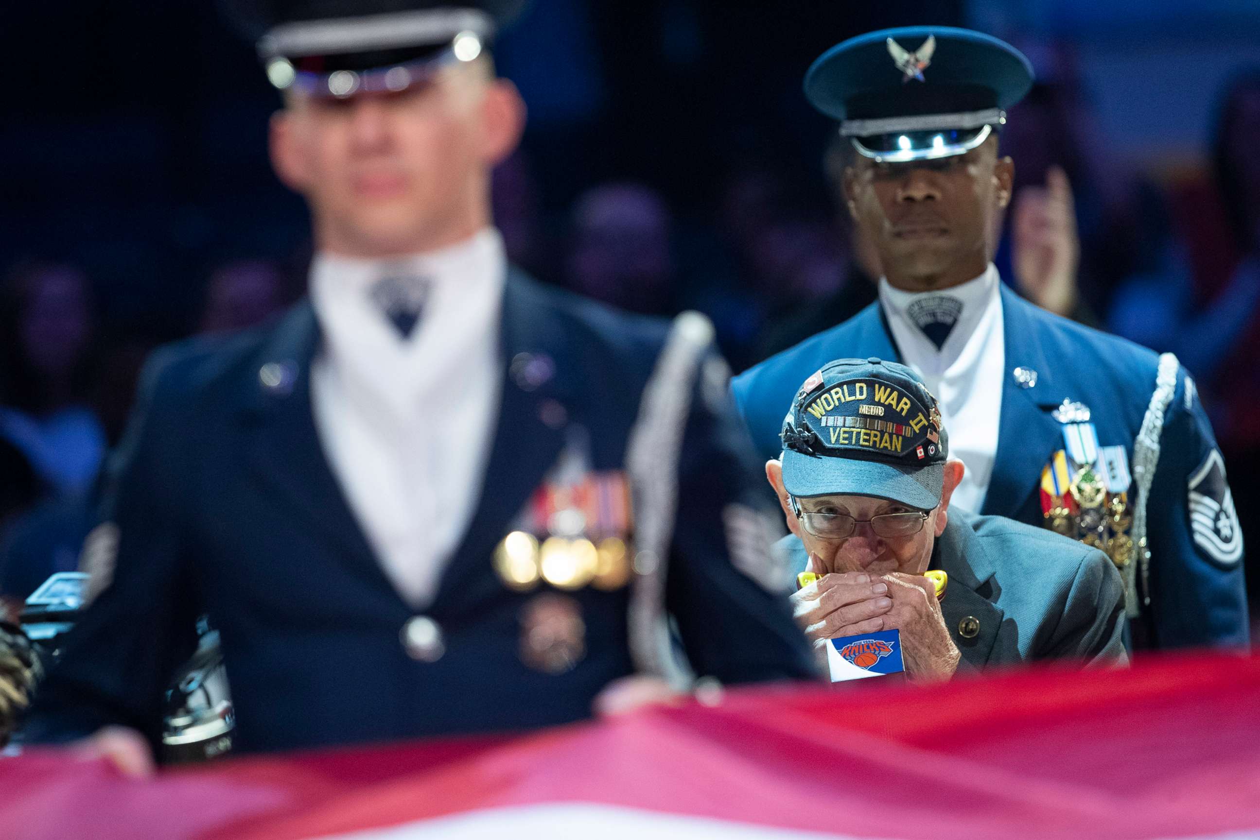 PHOTO: World War II veteran Pete Dupre, 96, plays the national anthem on his harmonica before an NBA basketball game between the New York Knicks and the Cleveland Cavaliers, Nov. 10, 2019, at Madison Square Garden in New York.