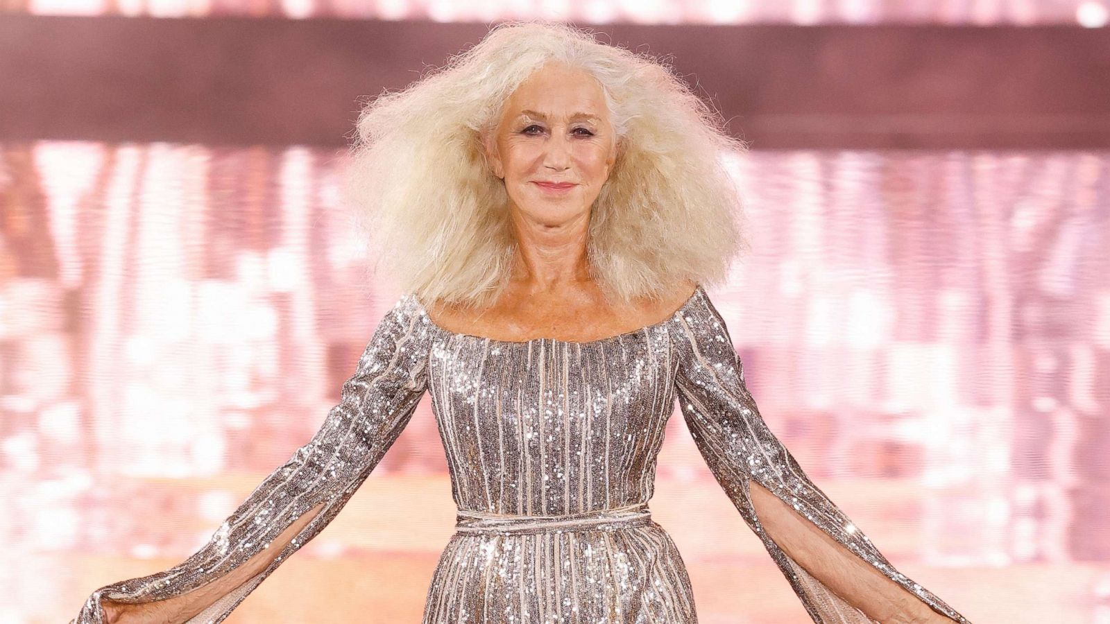 PHOTO: Helen Mirren walks the runway during the "Le Defile - Walk Your Worth" 6th L'Oreal Show as part of Paris Fashion Week at the Eiffel Tower. Oct. 1, 2023, in Paris.