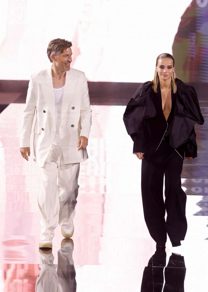 PHOTO: Nikolaj Coster-Waldau and Safina Waldau walk the runway during the "Le Defile - Walk Your Worth" - 6th L'Oreal Show as part of Paris Fashion Week at the Eiffel Tower, Oct. 1, 2023, in Paris.