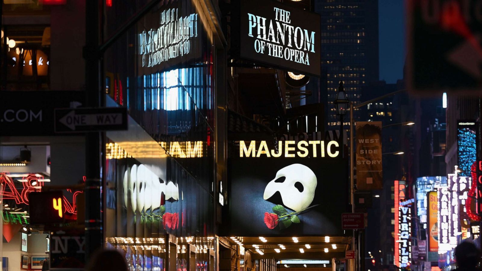 PHOTO: In this March 12, 2020, file photo, signage of the Broadway play "The Phantom of the Opera" is shown in Times Square in New York.