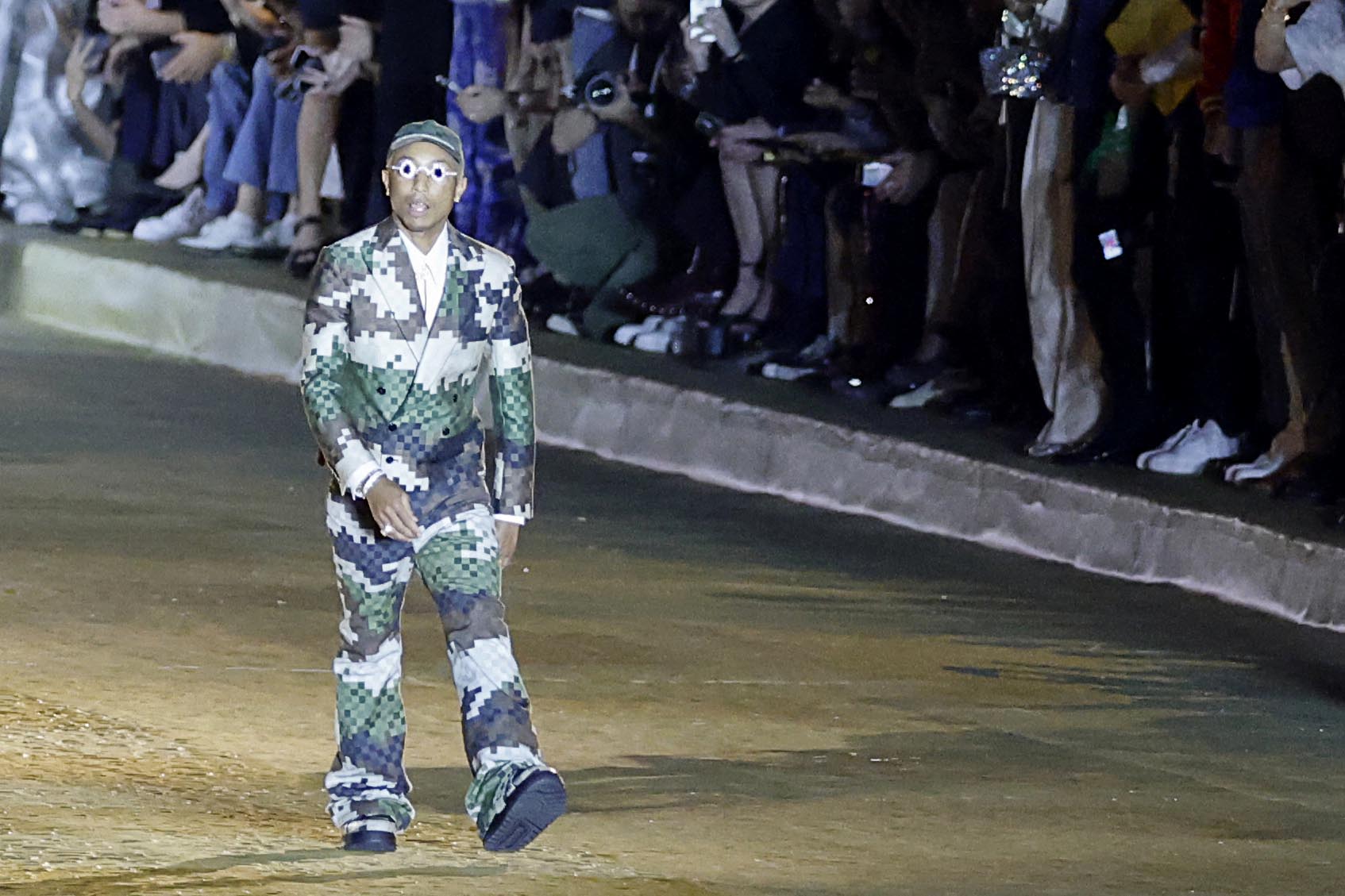 Pharrell Williams makes Louis Vuitton debut at star-studded show