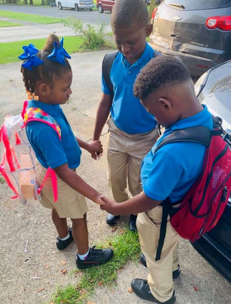 PHOTO: Jamisha Harris of Baton Rouge, Louisiana, posted a photo of her children Eugene Jacobs, 10, Jorden Jacobs, 8 and Emily Jacobs, 7, praying before the first day of school.