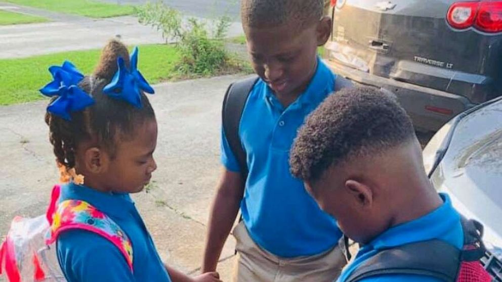 PHOTO: Jamisha Harris of Baton Rouge, Louisiana, posted a photo of her children Eugene Jacobs, 10, Jorden Jacobs, 8 and Emily Jacobs, 7, praying before the first day of school.