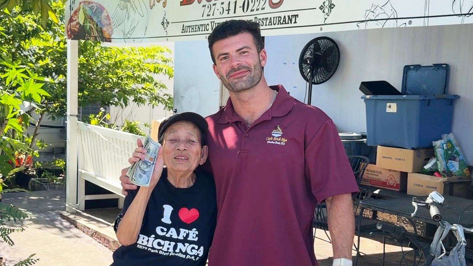 PHOTO: Mrs. Lieng poses with Julian Becerra, whose viral video helped raise more than $200,000 and secure a new home for the beloved Florida restaurant owner.