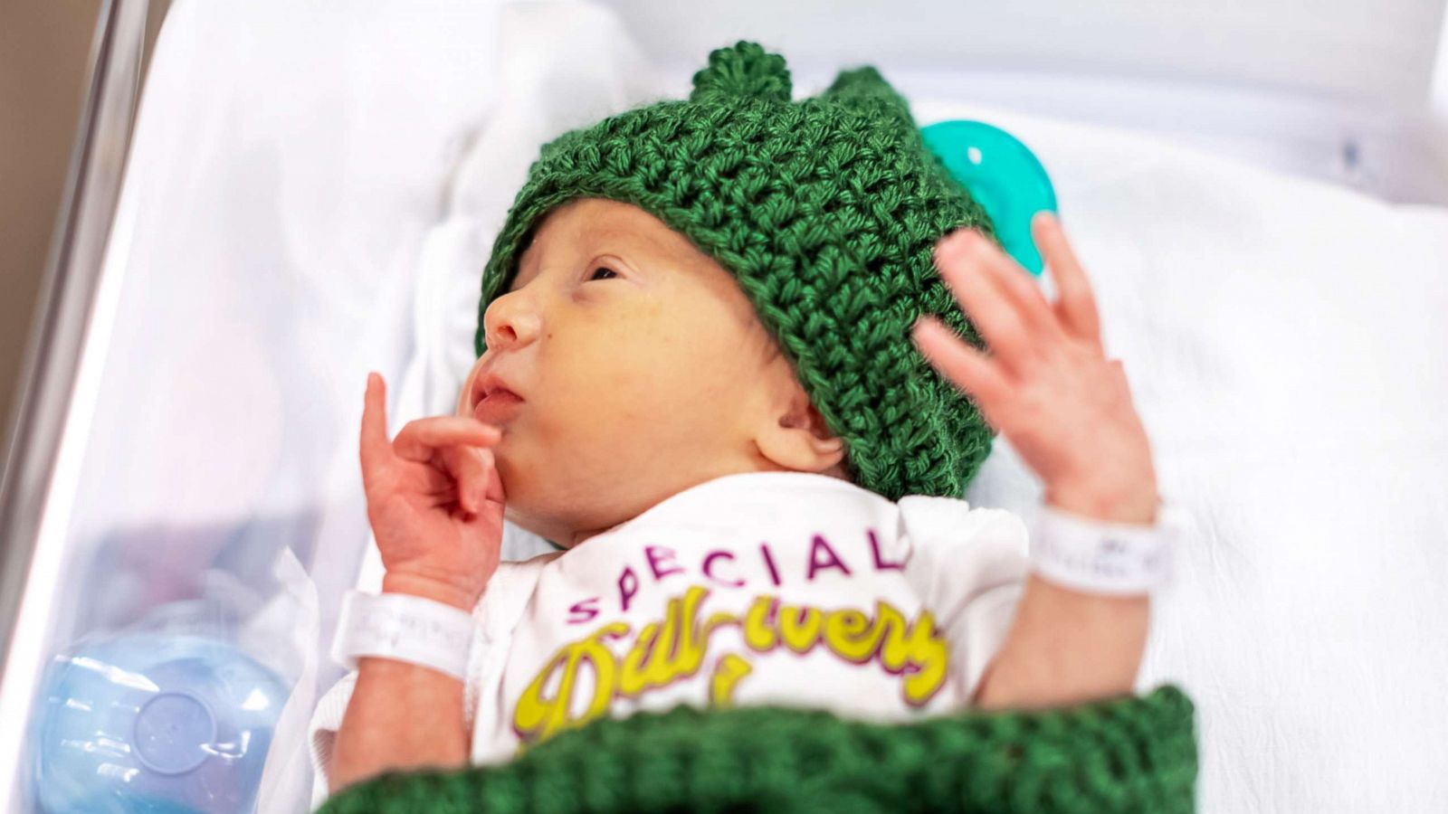 PHOTO: A newborn baby is dressed as a pickle at UPMC Magee Women's Hospital in honor of Pittsburgh's annual pickle festival, Picklesburgh.