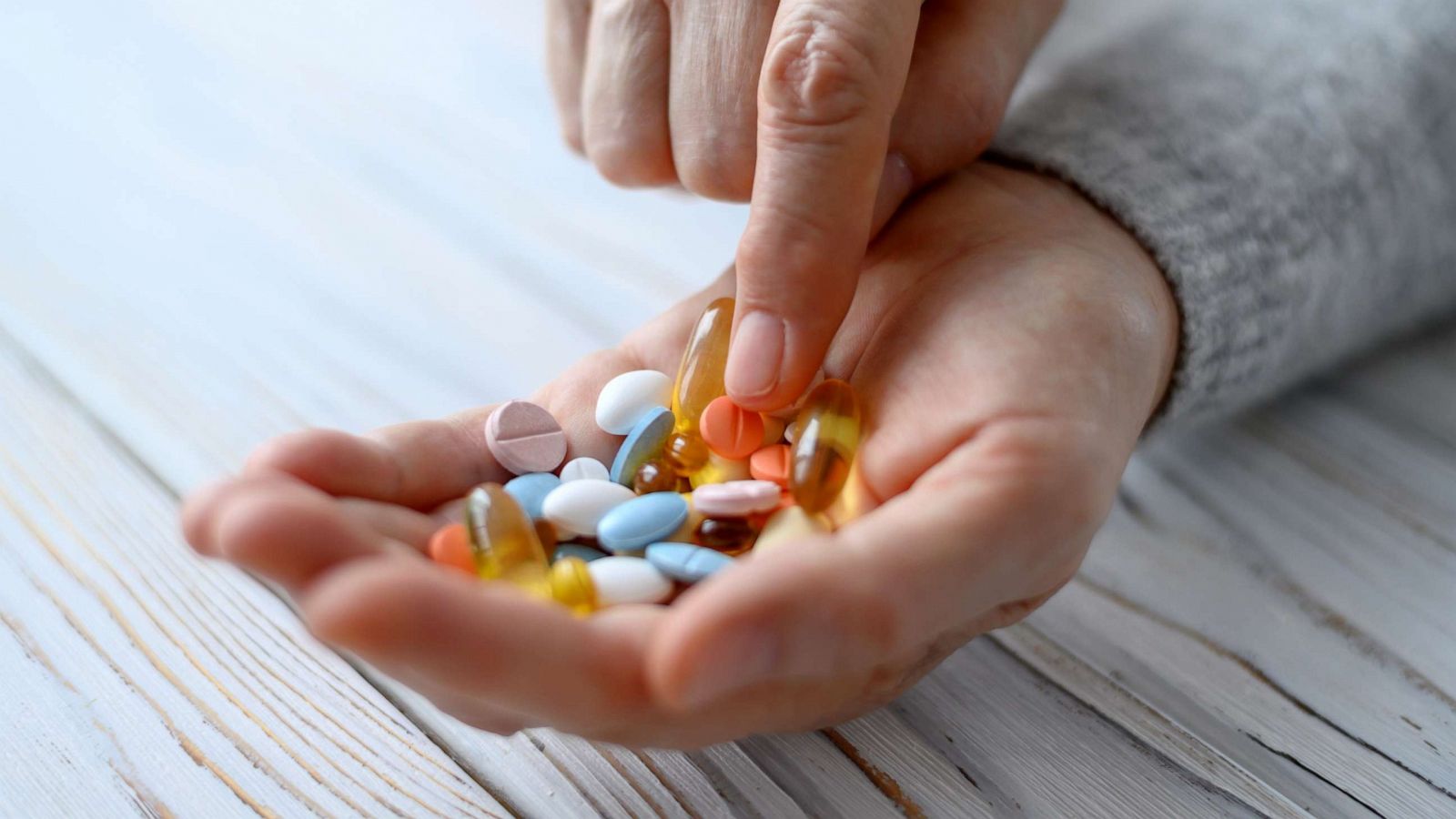 PHOTO: In this undated stock photo, a hand is shown holding pills.