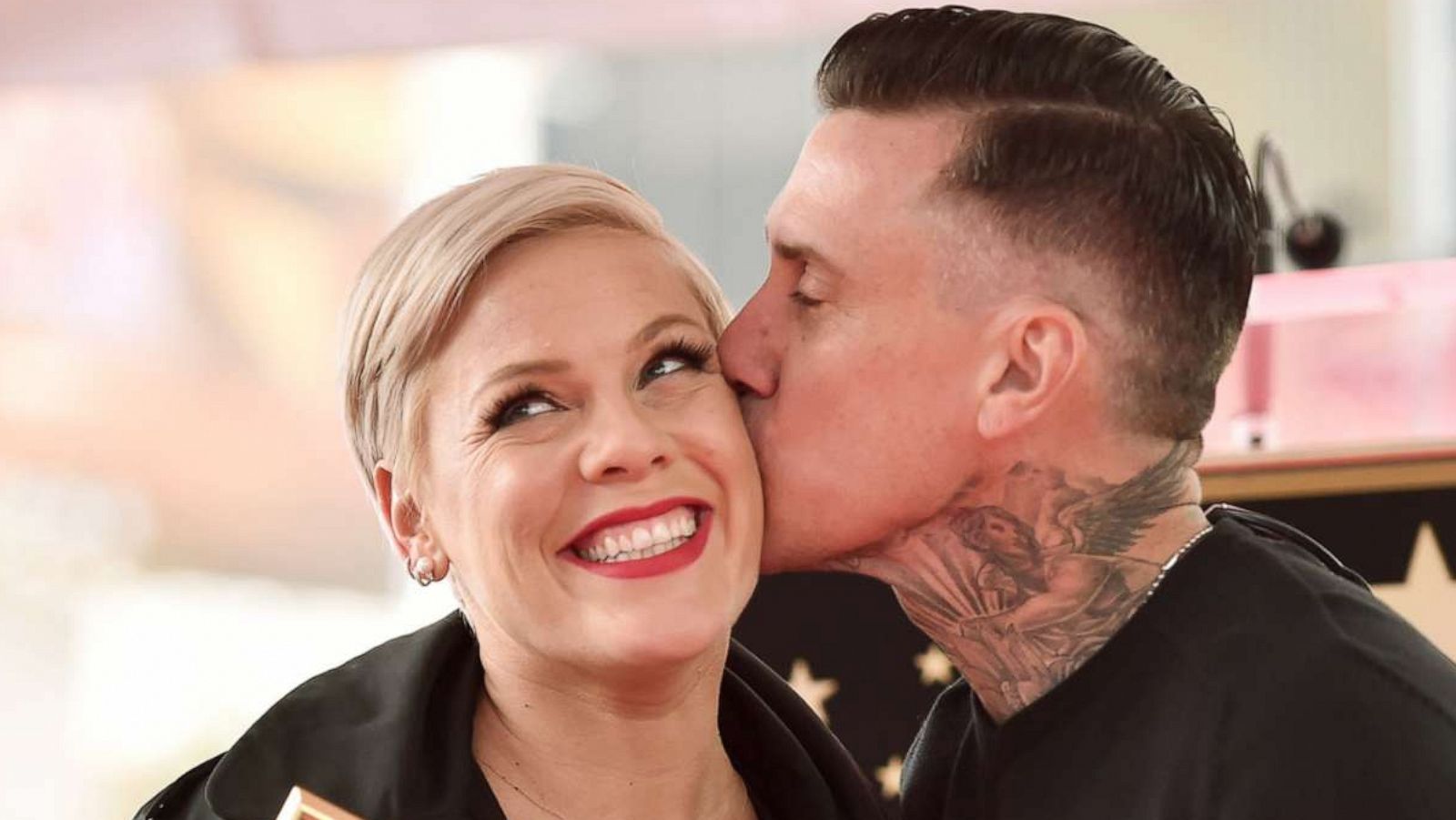 PHOTO: Pink gets a kiss from Carey Hart during a ceremony honoring her with a star on The Hollywood Walk Of Fame, Feb. 5, 2019 in Hollywood, Calif.