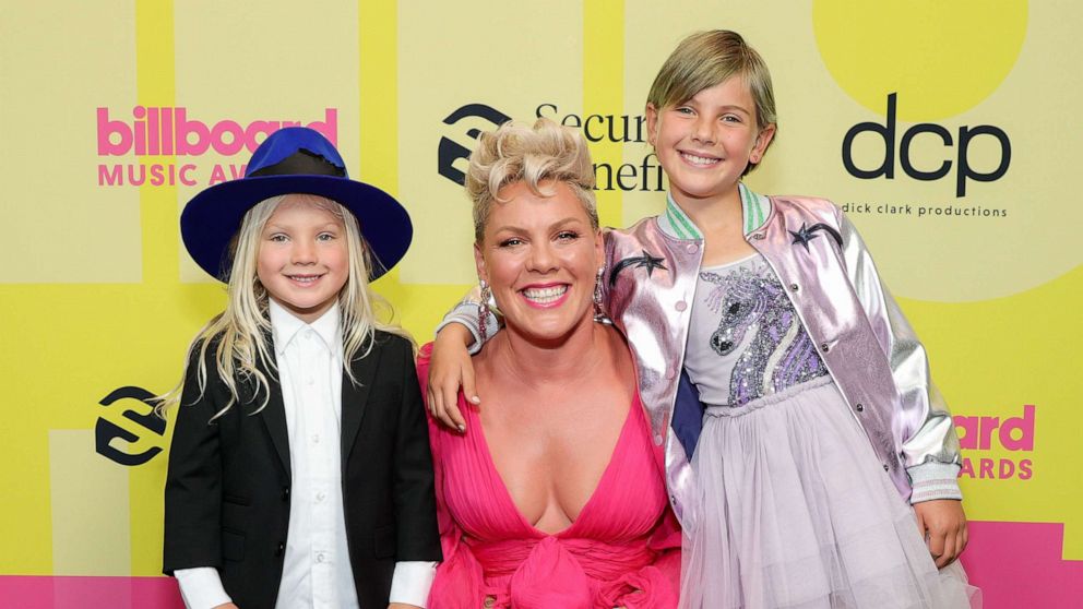 PHOTO: In this May 23, 2021, file photo, Jameson Moon Hart, Pink, and Willow Sage Hart pose backstage for the 2021 Billboard Music Awards in Los Angeles.