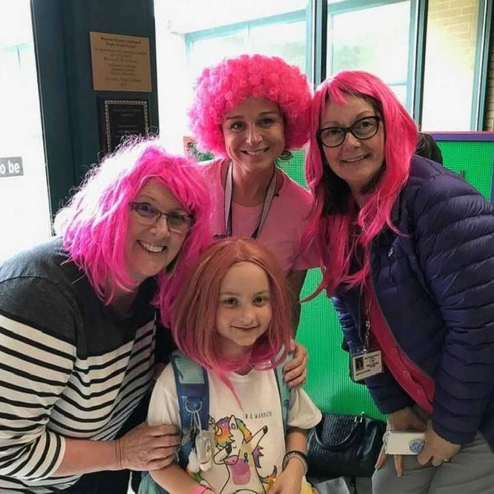 VIDEO: Meet the little girl who inspires a small town to wear pink wigs each year 