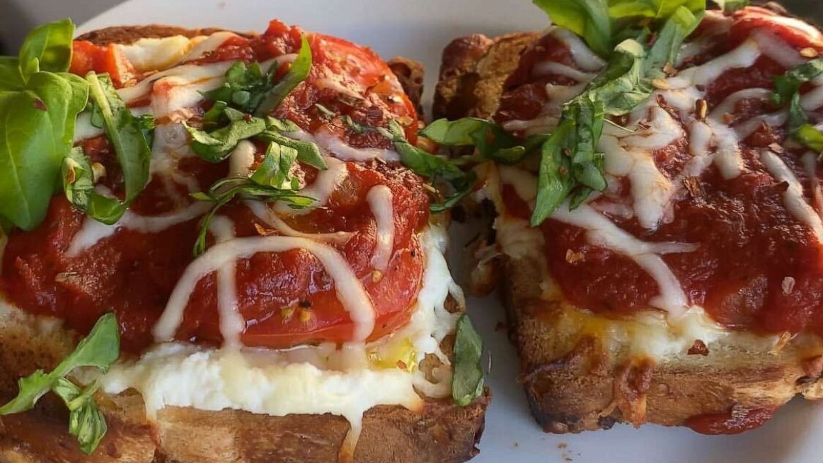 PHOTO: Homemade pizza toast with ricotta and mozzarella on sliced focaccia.