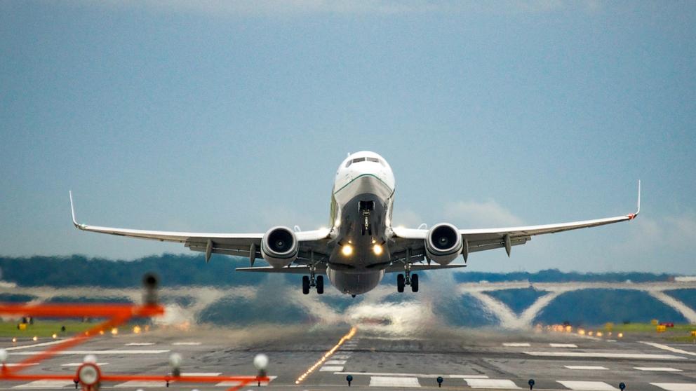 PHOTO: Stock image of a plane taking off.