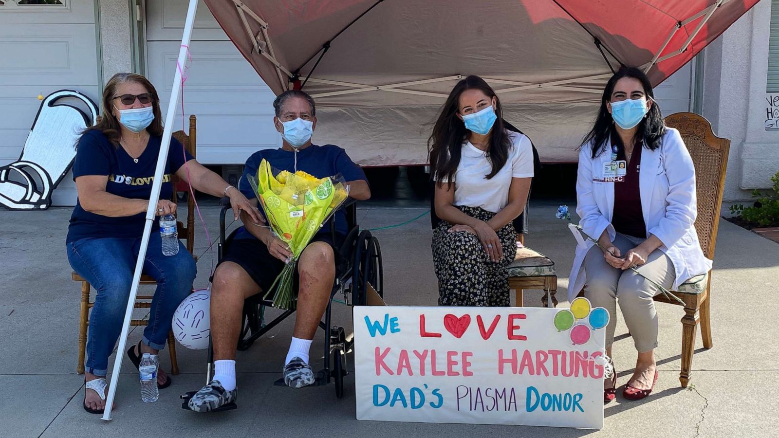 PHOTO: Kaylee Hartung poses for a photo with her plasma recipient, Daniel Macias, a COVID-19 survivor, his wife, Maritza, and his nurse, Lisa Diaz.