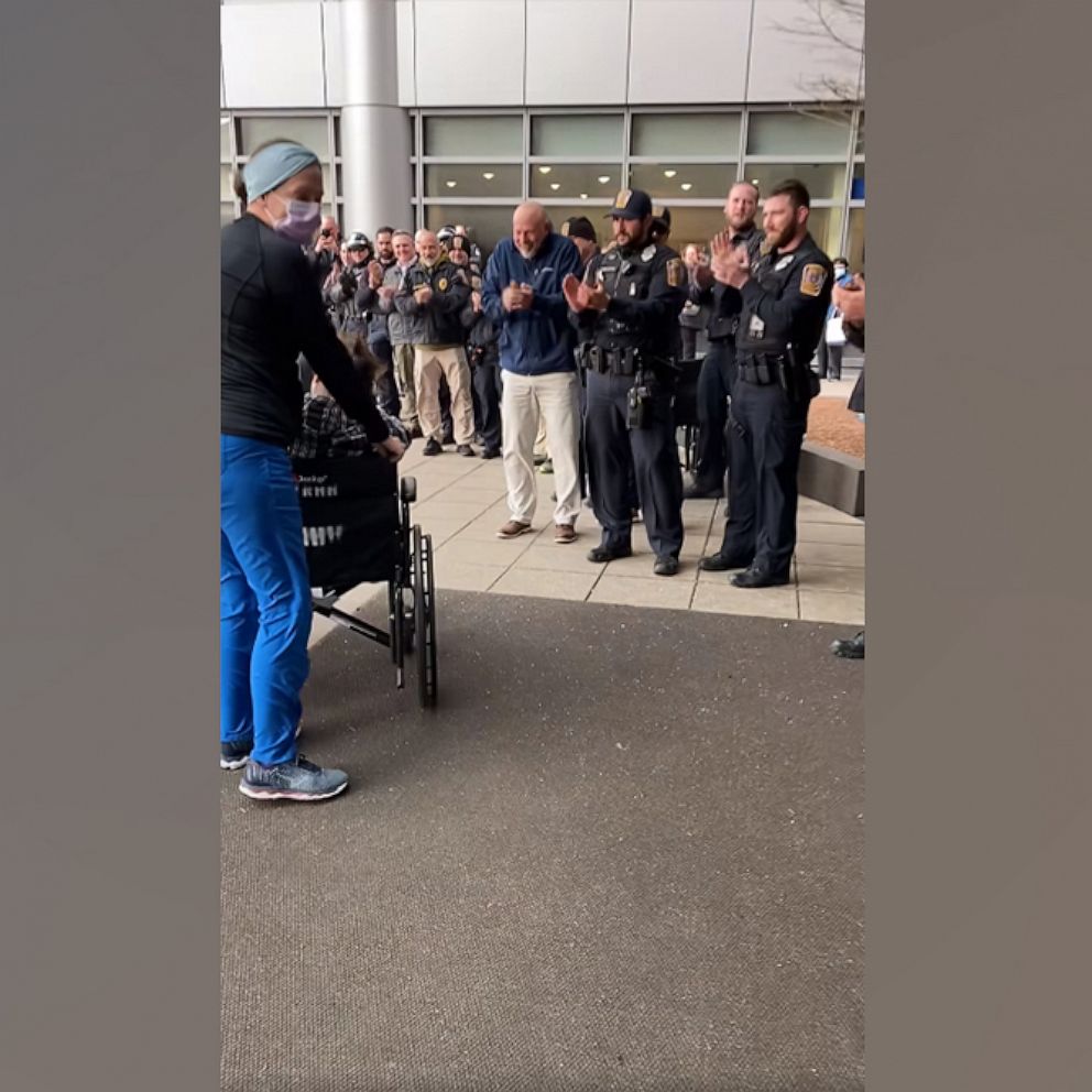 VIDEO: Connecticut police greet late colleague's wife, new baby as they leave hospital