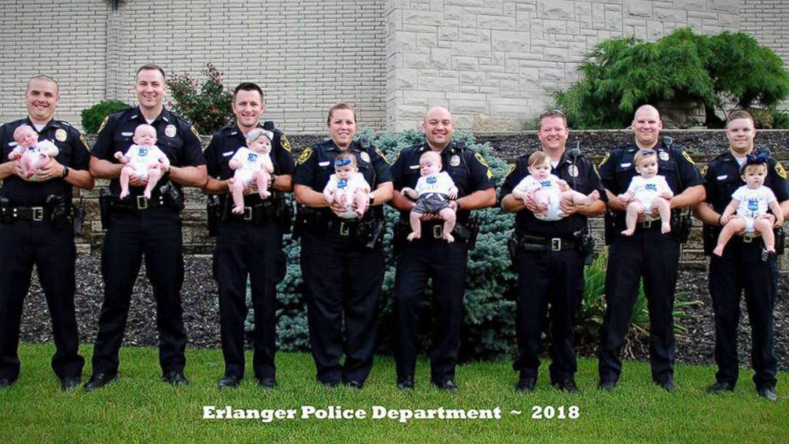 PHOTO: Seven dads and one mom from the Erlanger Police Department in Erlanger, Kentucky, proudly showed off their little ones in a photo after four boys and four girls were born to department staff in less than a year.