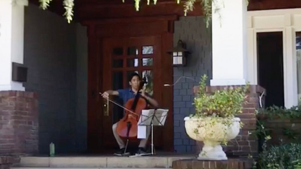 PHOTO: Beong-Soo Kim performs classical music on his cello on his porch in Pasadena, California during the COVID-19 shutdown.