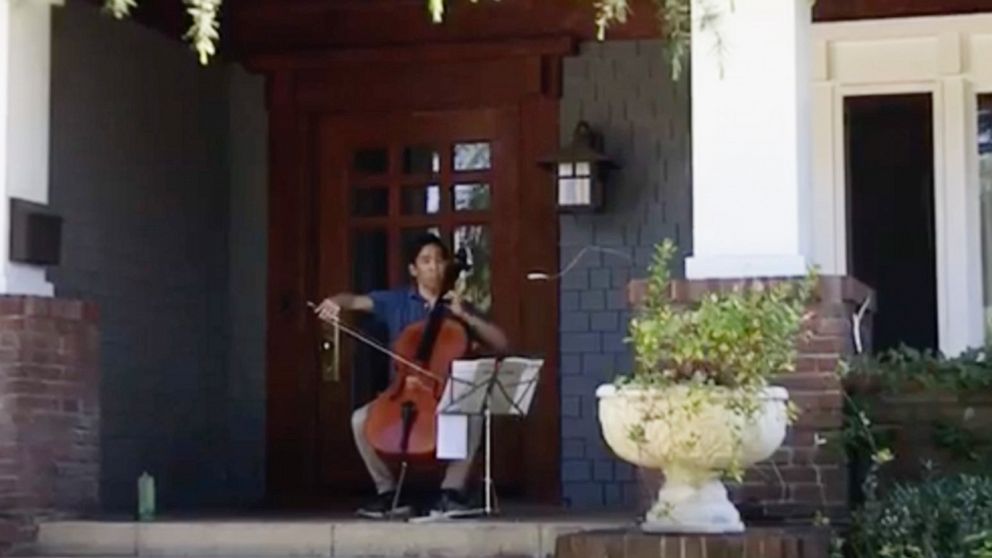PHOTO: Beong-Soo Kim performs classical music on his cello on his porch in Pasadena, California during the COVID-19 shutdown.