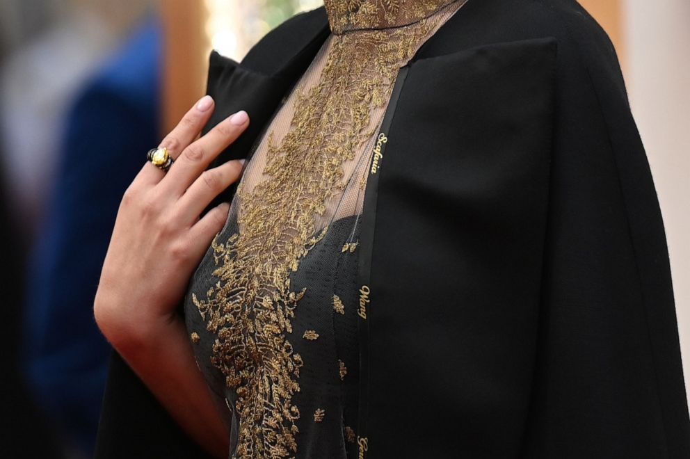 PHOTO: Actress Natalie Portman wears a cape embroidered with the names of female film directors who were not nominated for Oscars as she arrives for the 92nd Oscars at the Dolby Theatre in Hollywood, Calif., on Feb. 9, 2020.