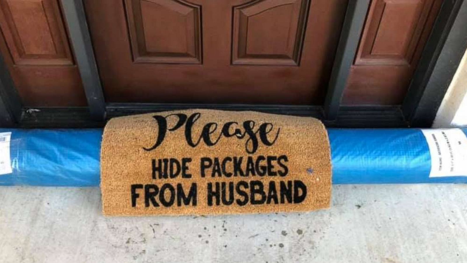 PHOTO: Ebony Freeman of Texas, shared a photo of her delivery after a UPS driver left her a roll of astro turf under the mat to apparently indicate it was "hidden."