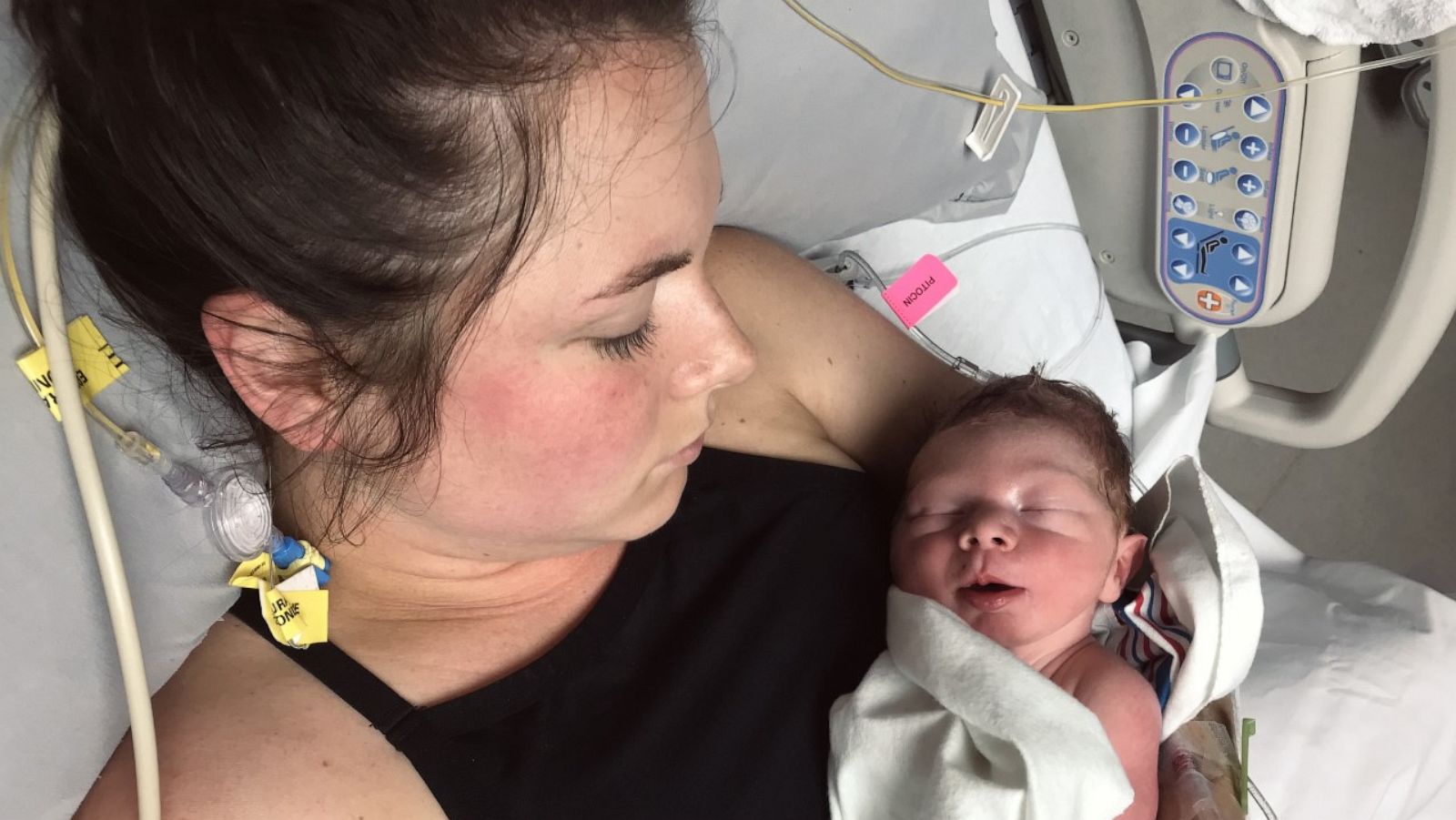 PHOTO: Natasha Eidson from Guymon, Oklahoma, looks down at her son Cooper after he is born in July of 2019.